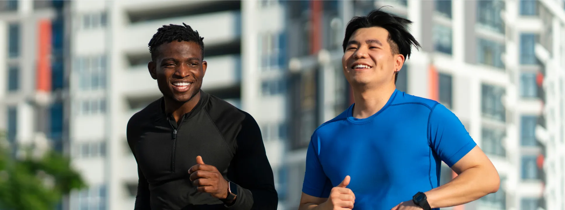 Two men jogging outside, representing increased energy and wellness after IV vitamin therapy.