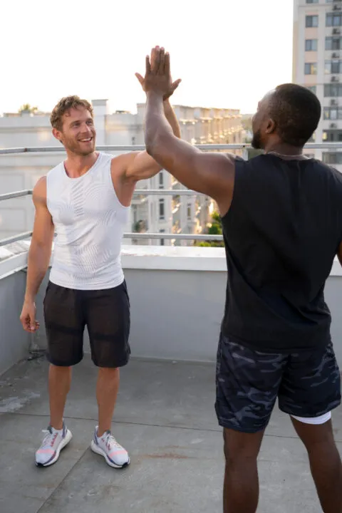 Active men preparing for outdoor training after body composition testing