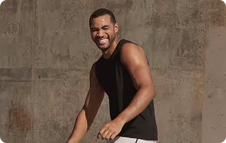 Athletic man exercising intensely, representing the motivation and results supported by weight-loss treatments.