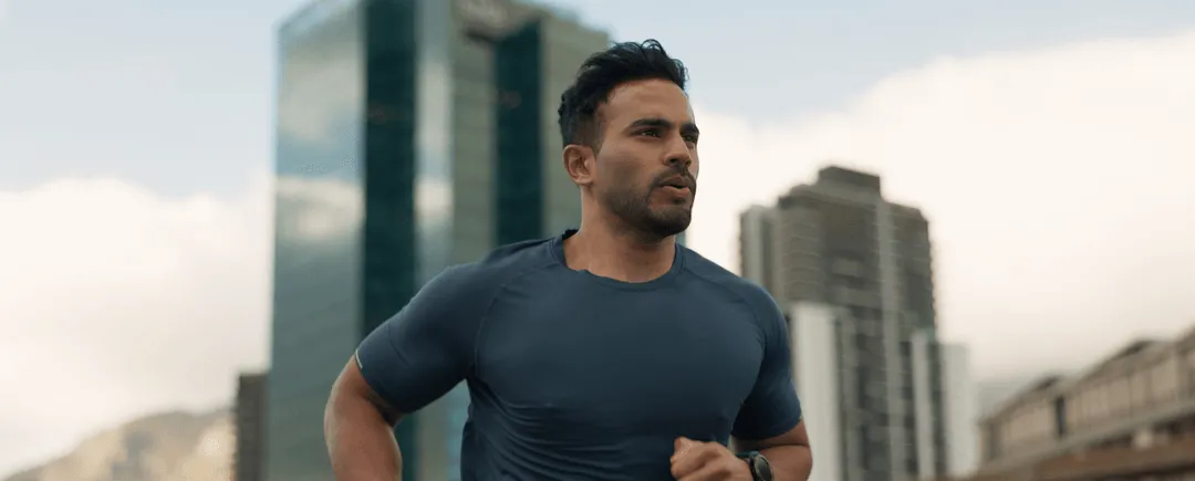 Man running in the city after GHRH therapy to support energy, stamina, and hormone balance
