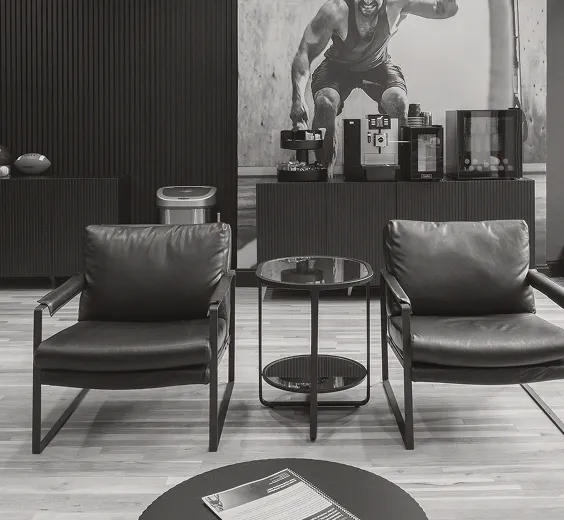 Modern clinic waiting area with chairs and treatment products displayed, representing the professional care environment at Gameday Men’s Health