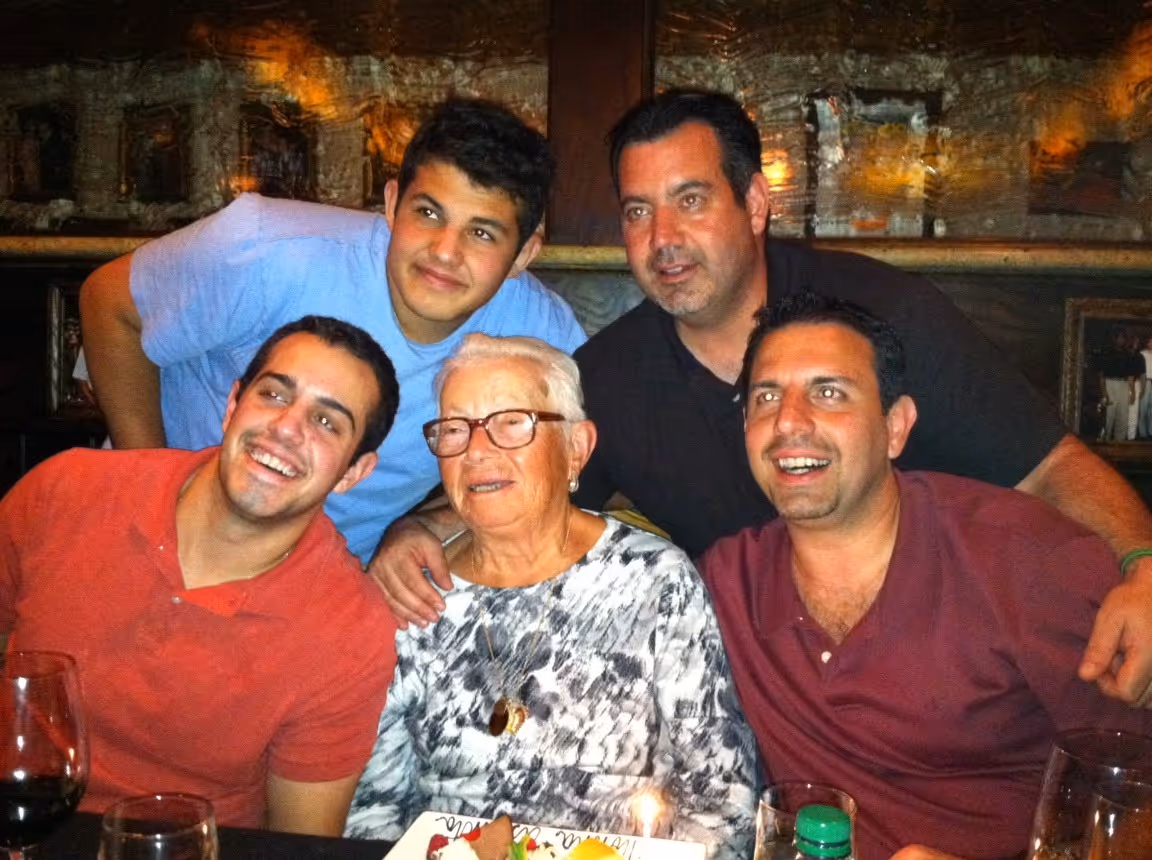 a group of people posing for a photo