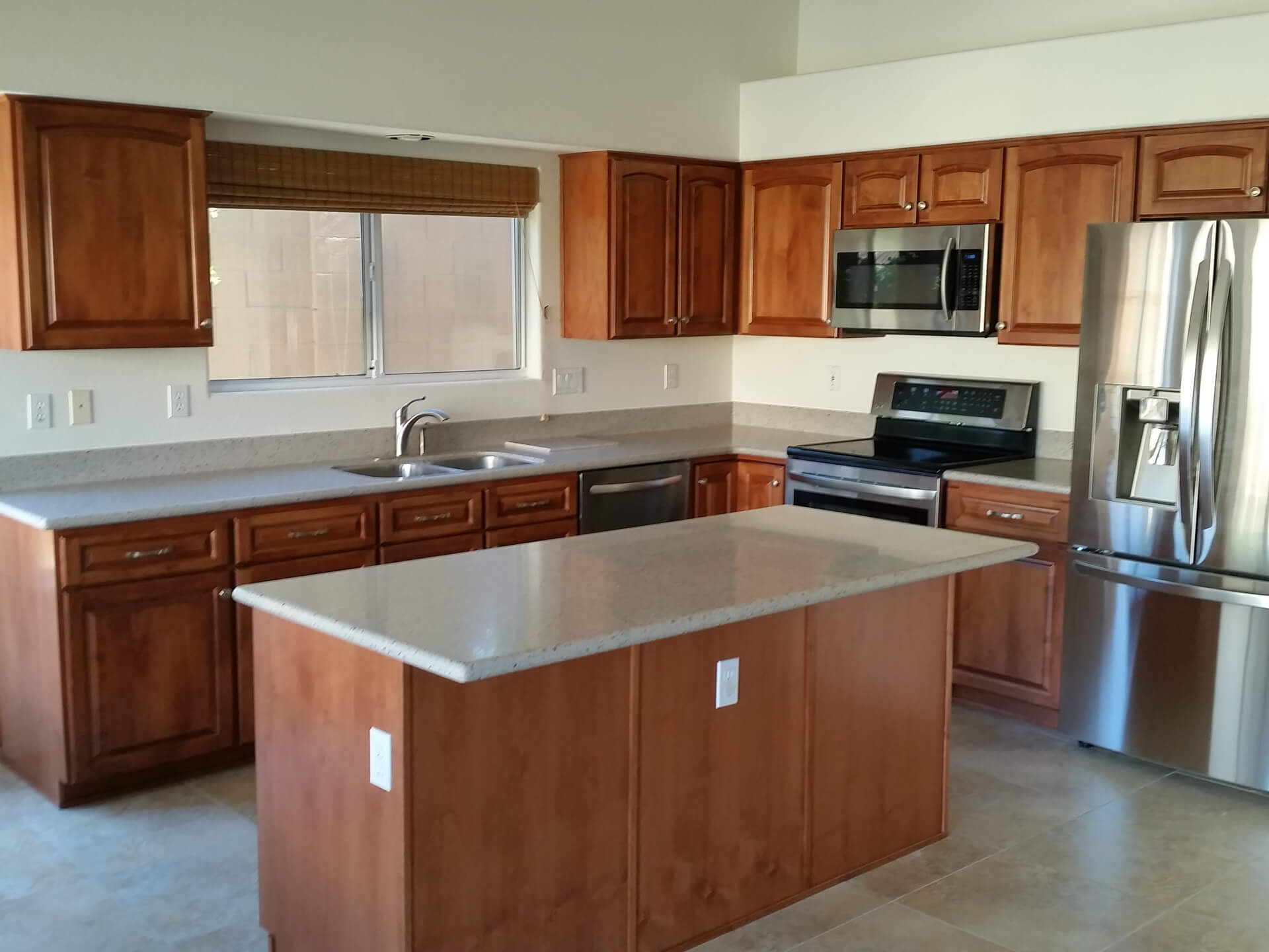 Builder Cabinets to Stained Raised Panel