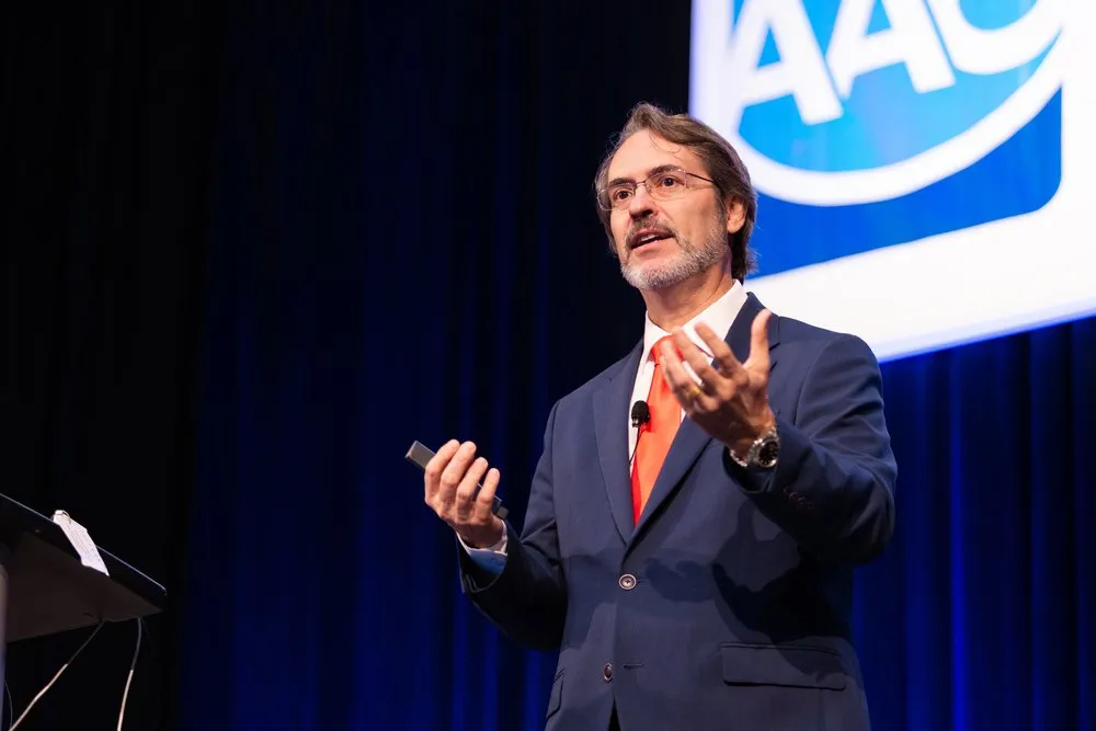 Keynote speaker presenting at corporate event filmed by Mile 1 Media