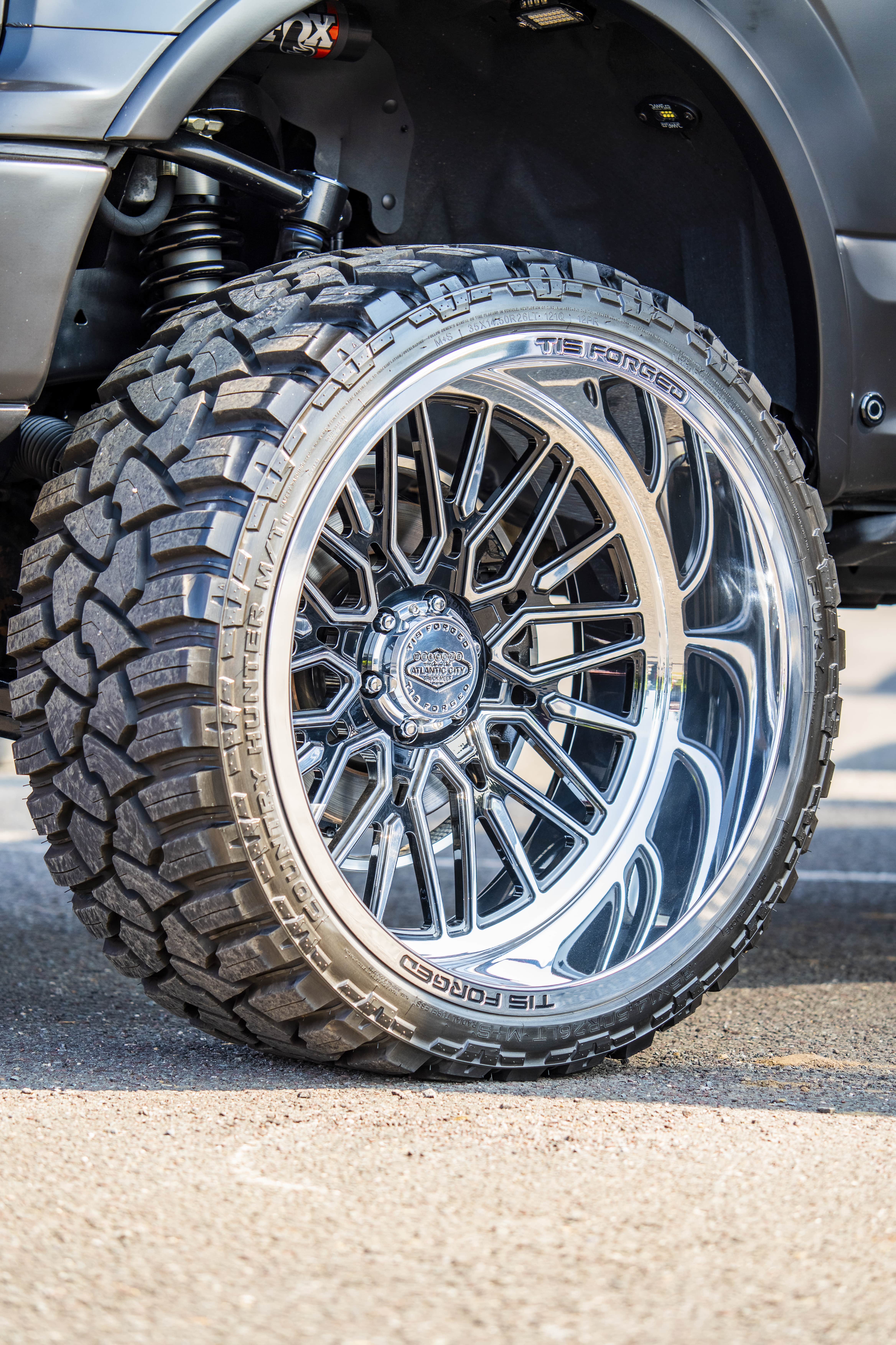Off-road truck wheel filmed by Mile 1 Media