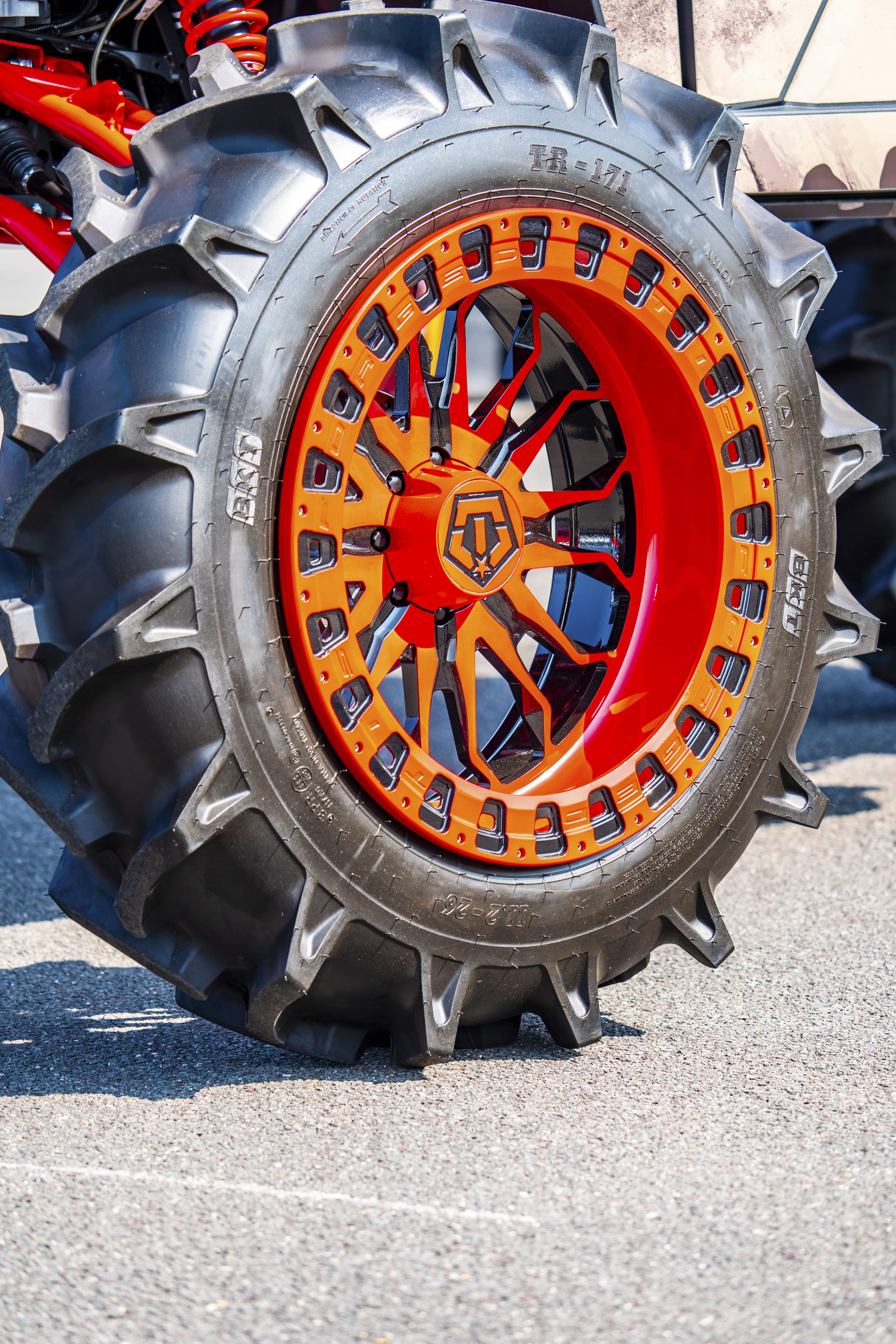 Orange off-road tire filmed by Mile 1 Media for Fitment Industries