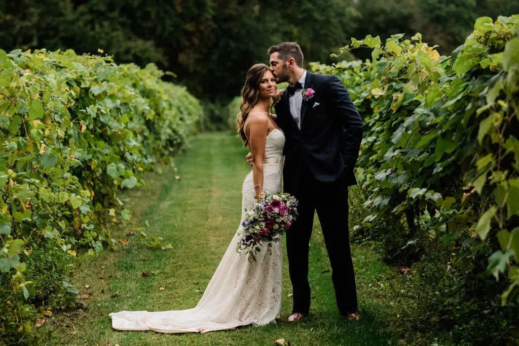 Groom portrait in garden setting - Florida wedding photography by Mile 1 Media
