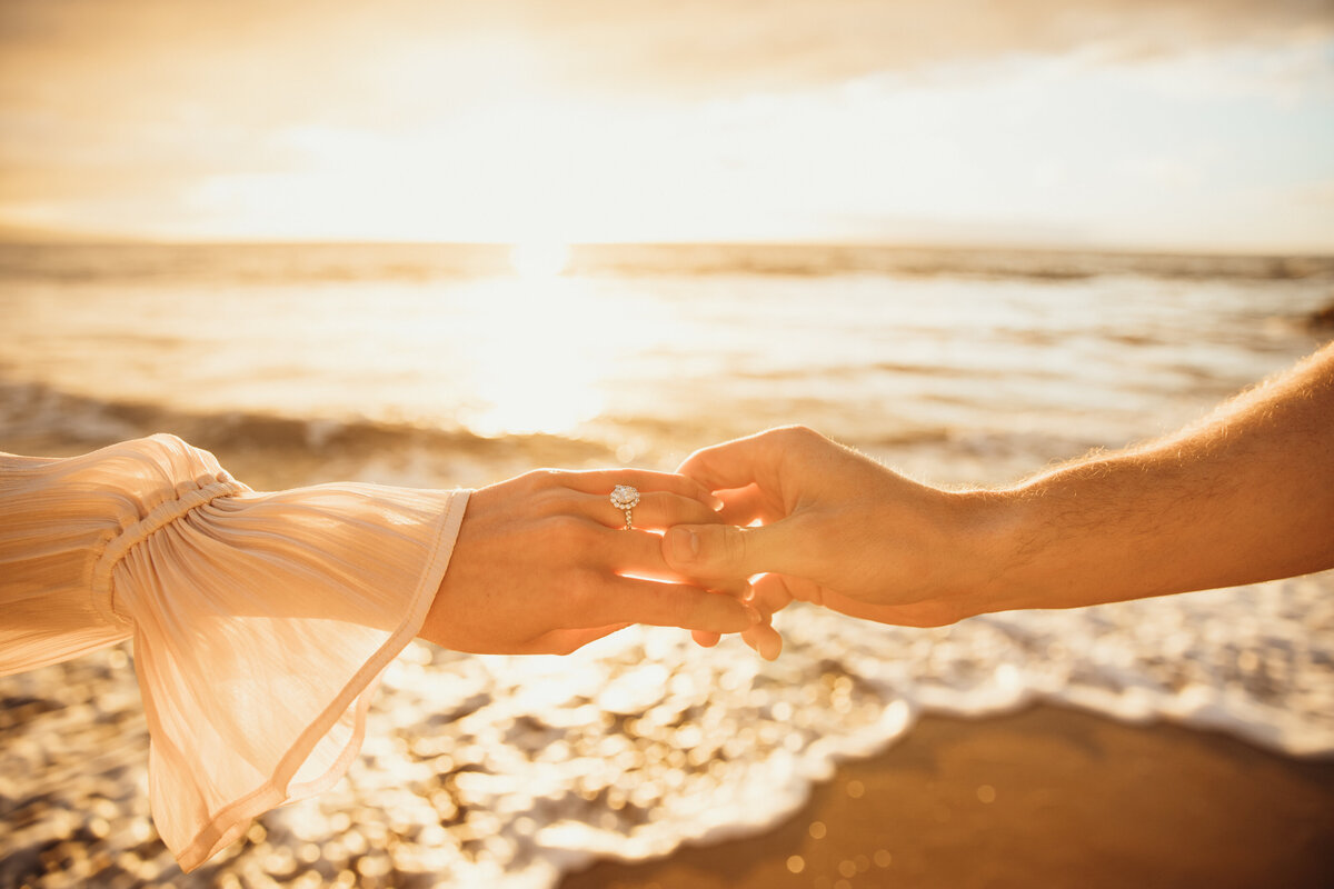 Engagement ring detail shot at golden hour beach photography Stuart FL