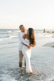 Bride walking on beach at sunset - Florida wedding photographer Mile 1 Media