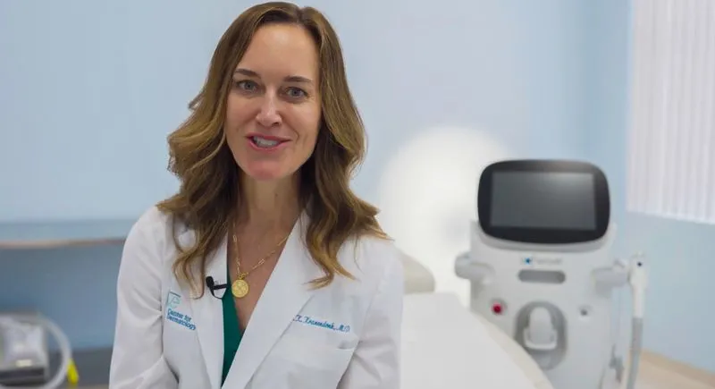 Doctor demonstrating a device during a Palm Beach Gardens video shoot