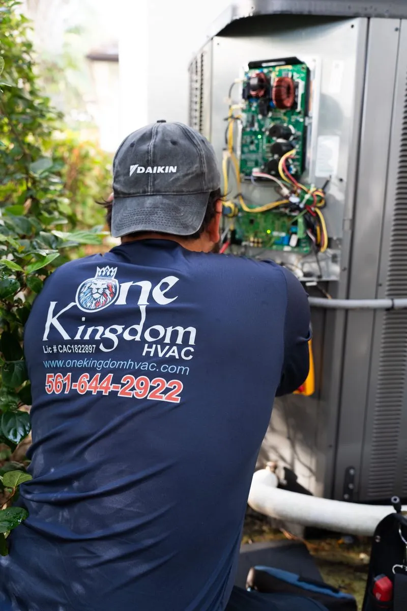 HVAC technician filmed on location for a Broward County home services brand
