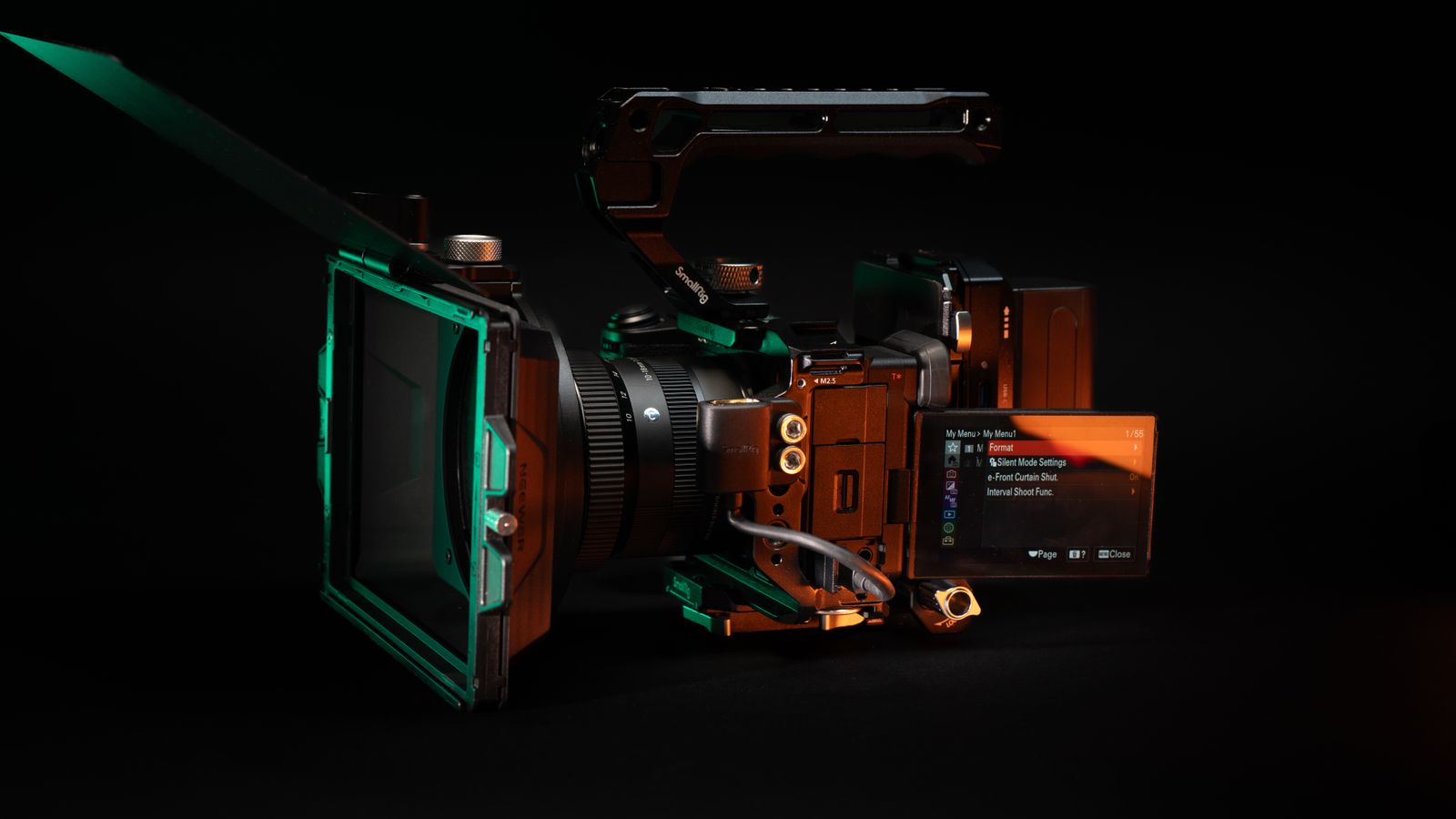 High-quality video camera rig featuring lens and display screen, ideal for filmmaking and studio work.