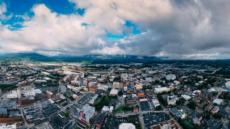 Panoramic aerial view capturing Chattanooga's vibrant skyline and surroundings.