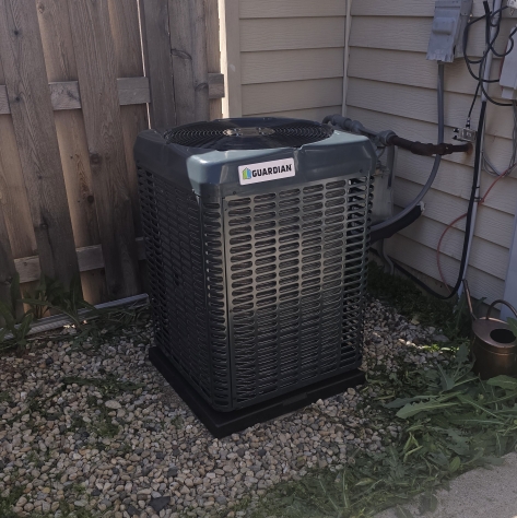 image of plumber fixing a sink