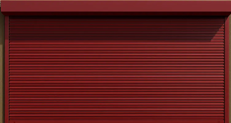Closed red metal roller shutter door with small horizontal ridges.