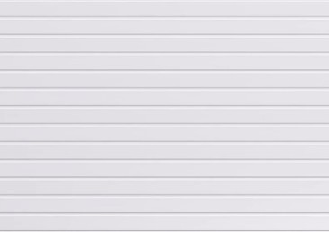 Close-up of horizontal white aluminum flute siding with subtle shadows and texture.