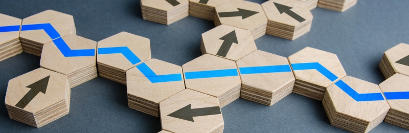 Hexagon blocks connected by blue paths with directional arrows