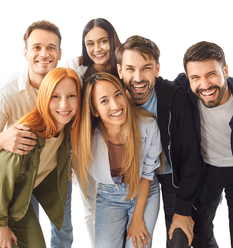 Six diverse young adults smiling and leaning forward together.