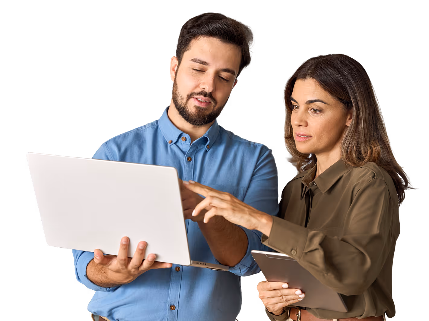 Man in blue shirt holding a laptop and woman in brown shirt holding a tablet, both looking at the laptop screen.