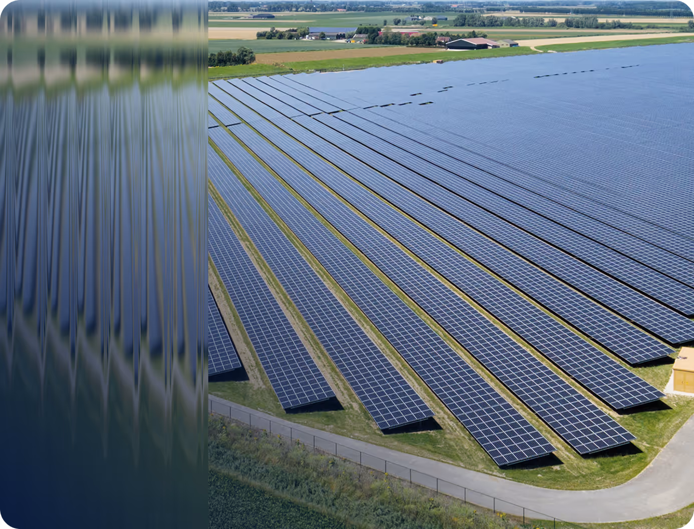 A vast solar farm with numerous rows of solar panels installed on green grass fields.