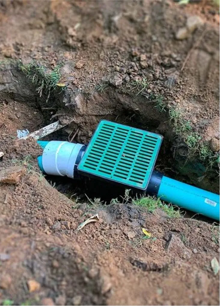 Green catch basin installed for residential drainage system
