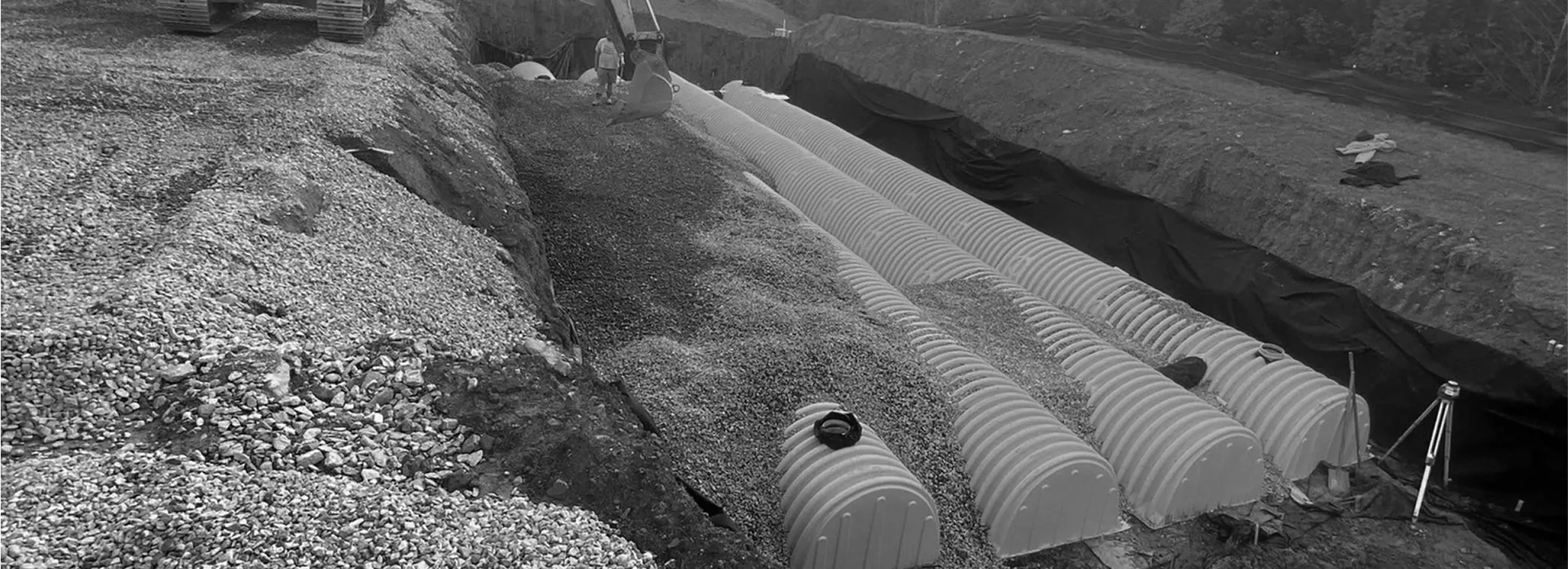 Construction site with slope protection and erosion-control materials