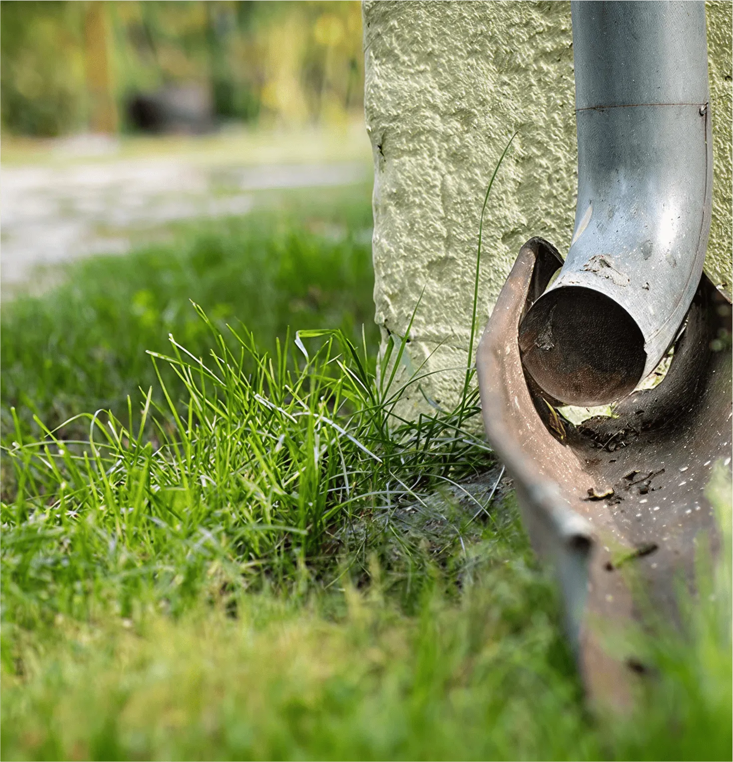 Residential underground drainage pipe connection to drywell system
