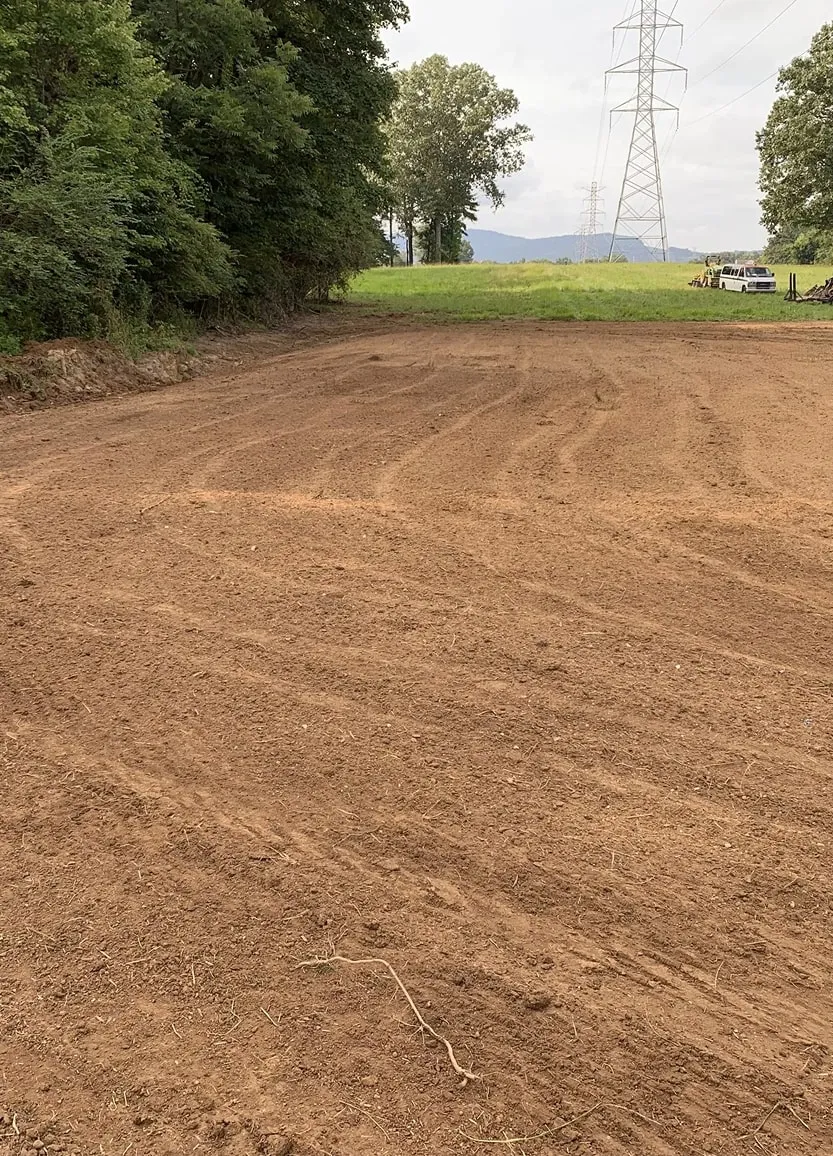 Freshly graded soil surface prepared for landscape installation