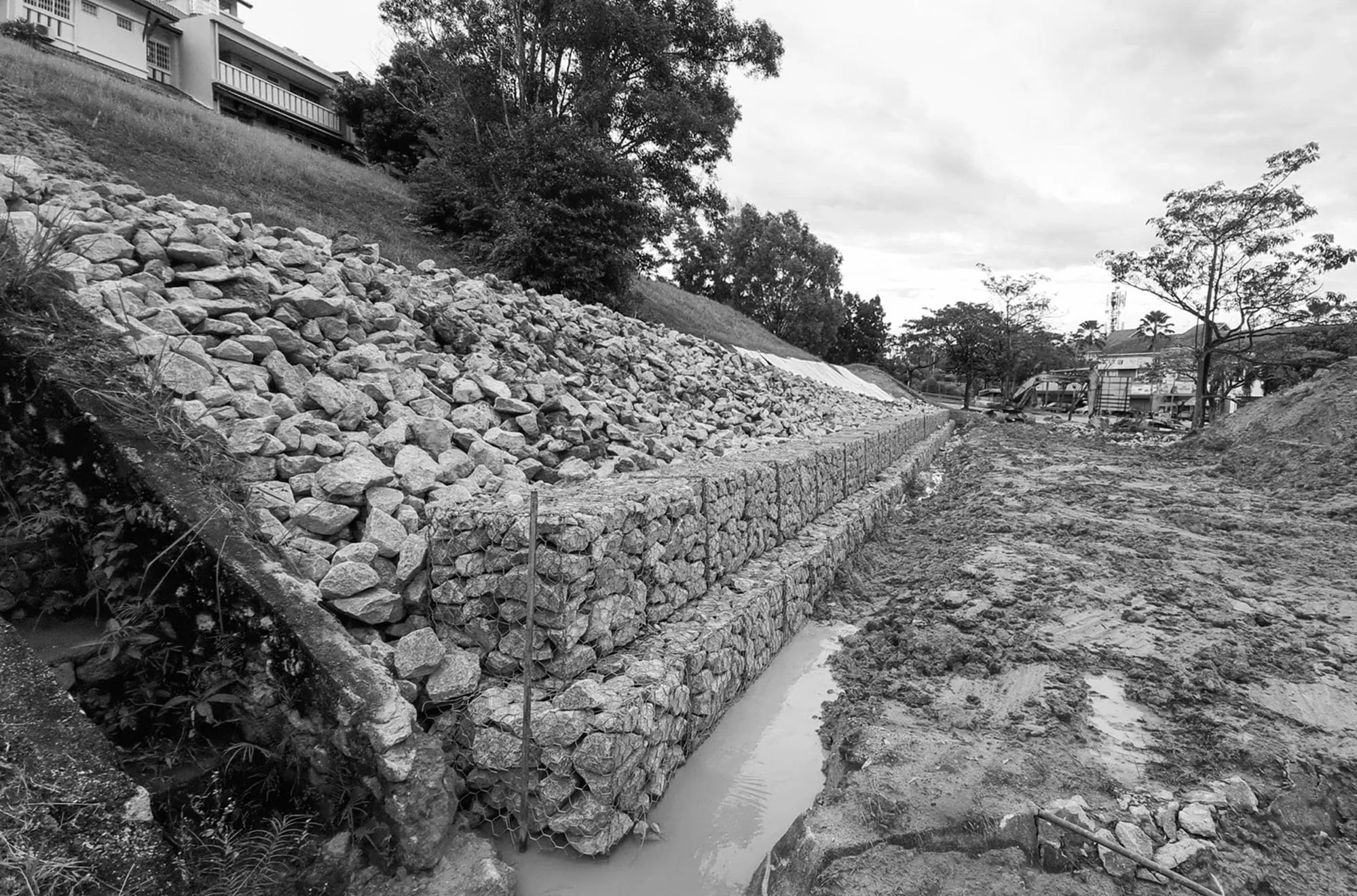 Stone embankment wall protecting terrain from soil erosion