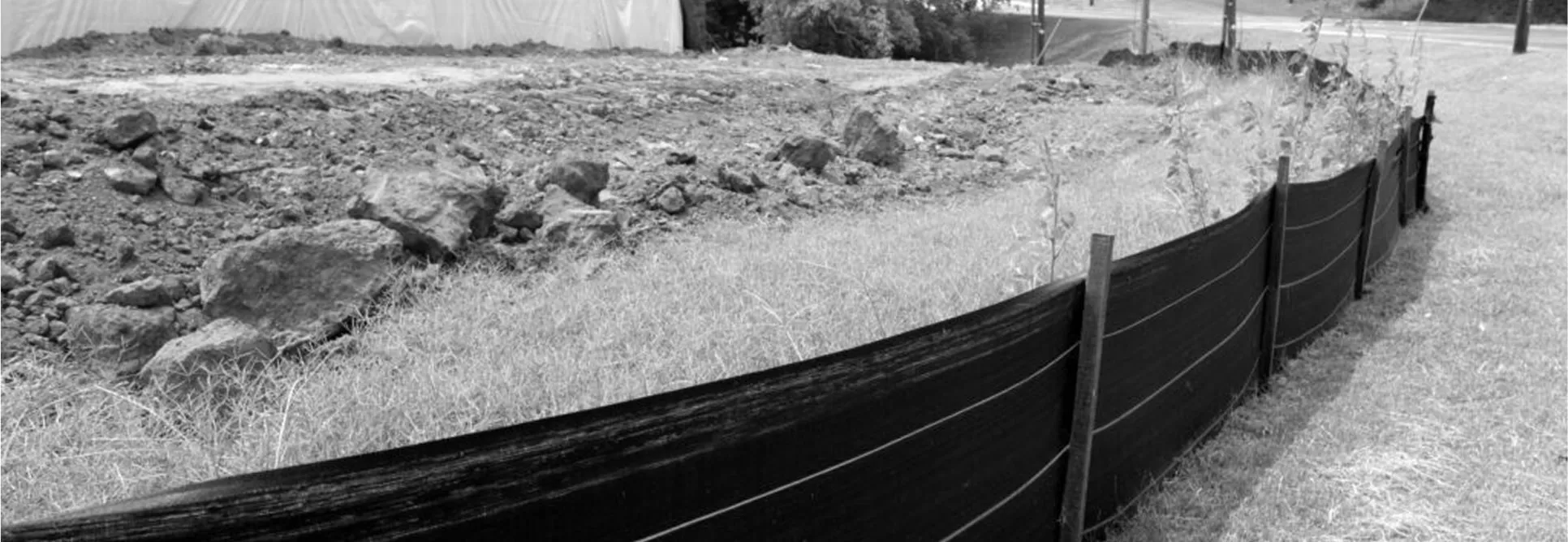 Construction site erosion barrier and fencing for drainage control