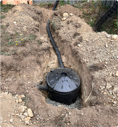downspout drainage rerouted to drywell