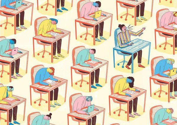 People working together on their desks with their heads down in stress and workload