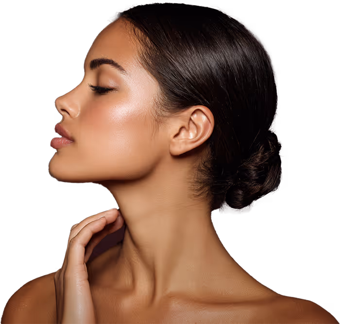 Profilbilde av kvinne med glatt hud, lukket øyne og mørkt hår samlet i en lav knute.