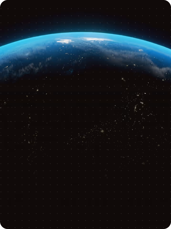 View of Earth from space showing the planet's curve with a bright blue atmosphere and dark space background with scattered stars.