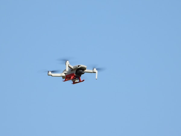 A drone flying in the sky over the beach in Tampa Bay, Florida, by drone photographer Anita Denunzio