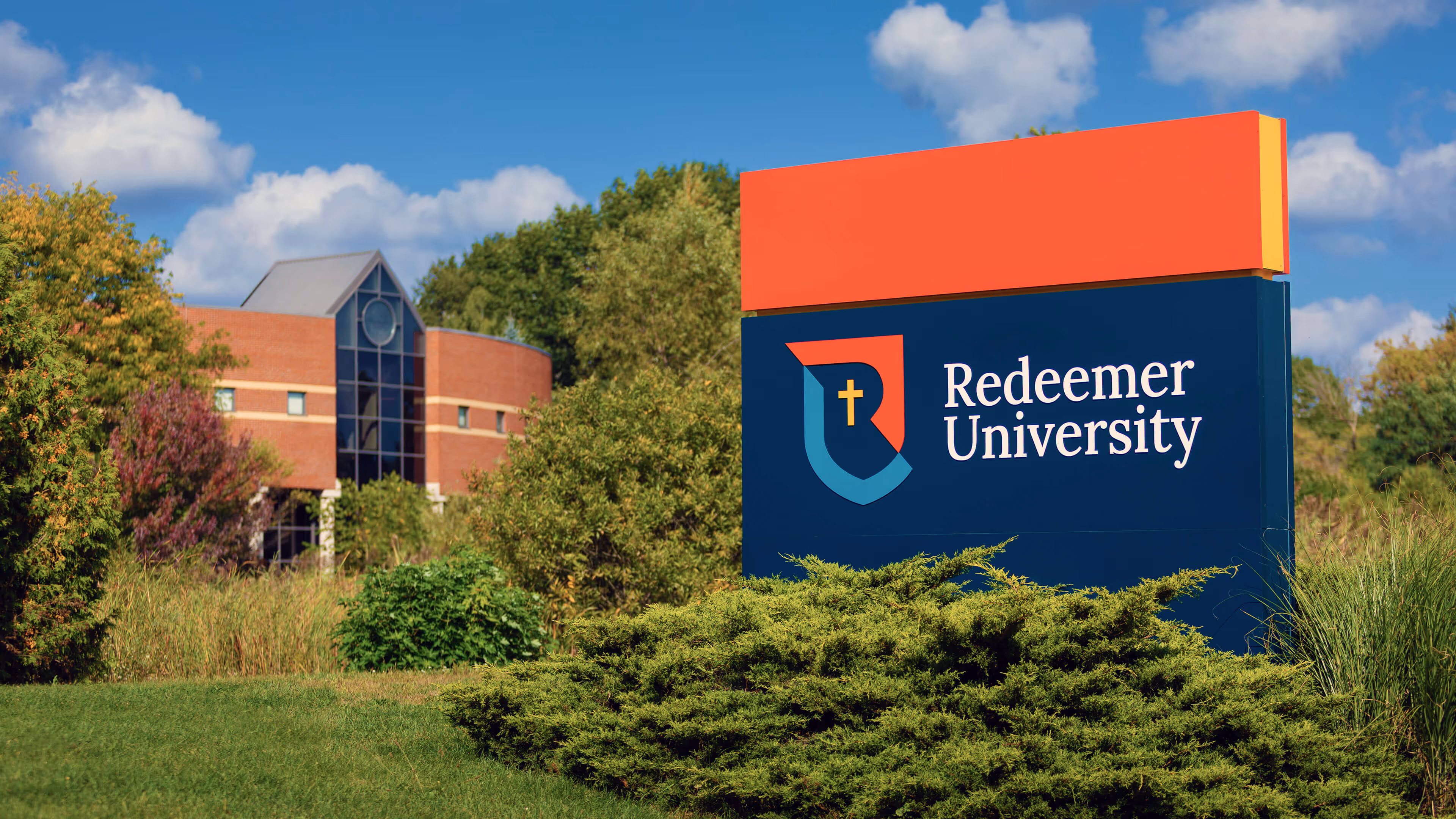 Large redeemer University Sign at entrance of school