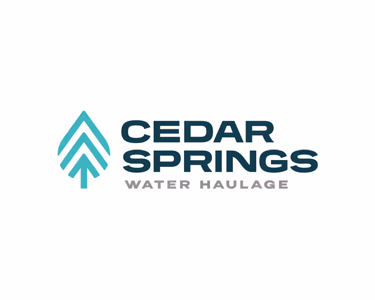 Cedar Springs Water Haulage logo with a stylized blue-green pine tree symbol to the left of the company name in bold dark blue and gray text.