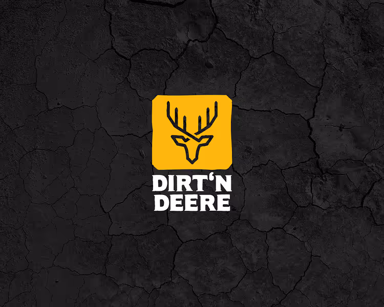 Yellow square with black stylized deer head above white text 'DIRT'N DEERE' on a cracked dark soil background.