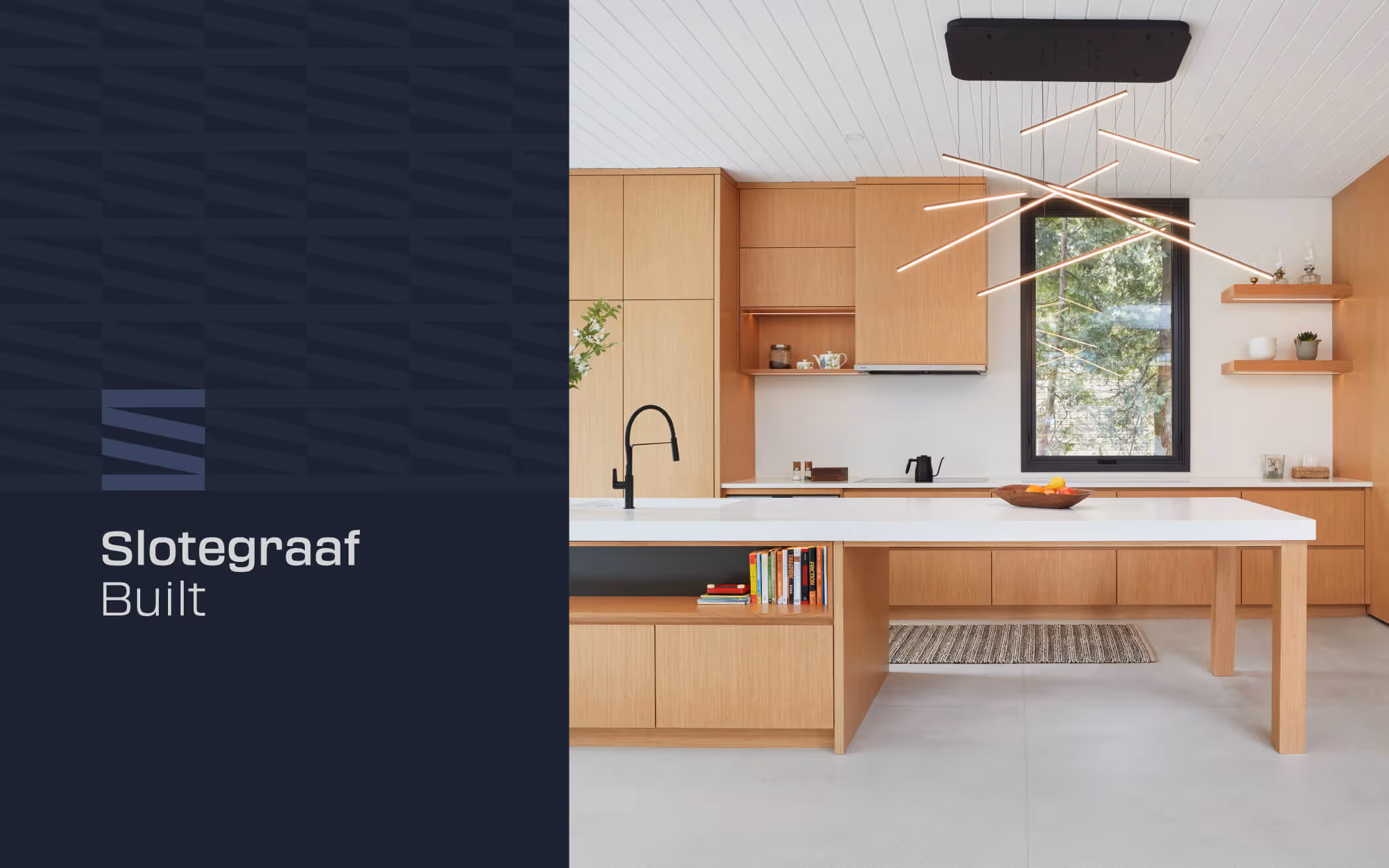 Modern kitchen with light wood cabinets, white countertops, built-in cooktop, black faucet, large window, and geometric pendant light.