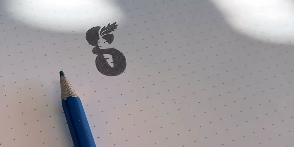 Blue pencil next to a small shaded sketch of a stylized character on dotted white paper.