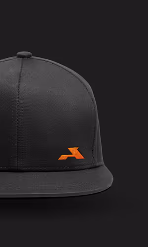 Black baseball cap with a small orange stylized letter A logo on the front.