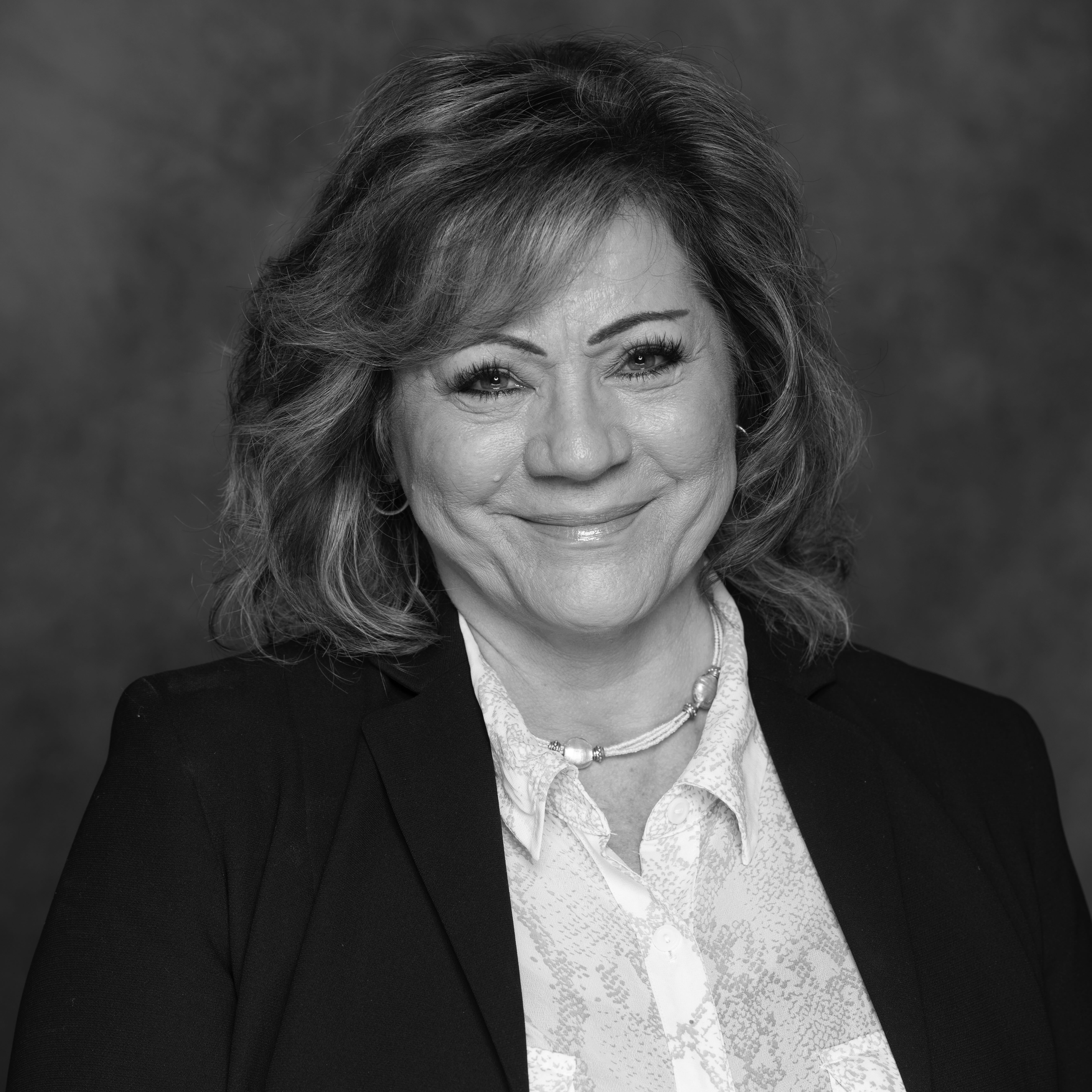 Headshot of Keith D. Fitzpatrick, Advisor - CFO at How to Manage a Small Law Firm, wearing plaid button down shirt and glasses.