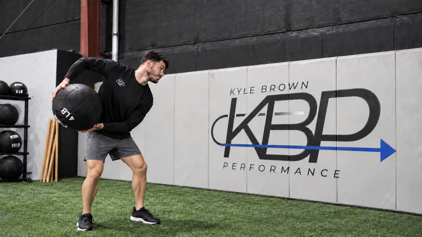 Kyle Brown performing a rotational medicine-ball drill at KBP.