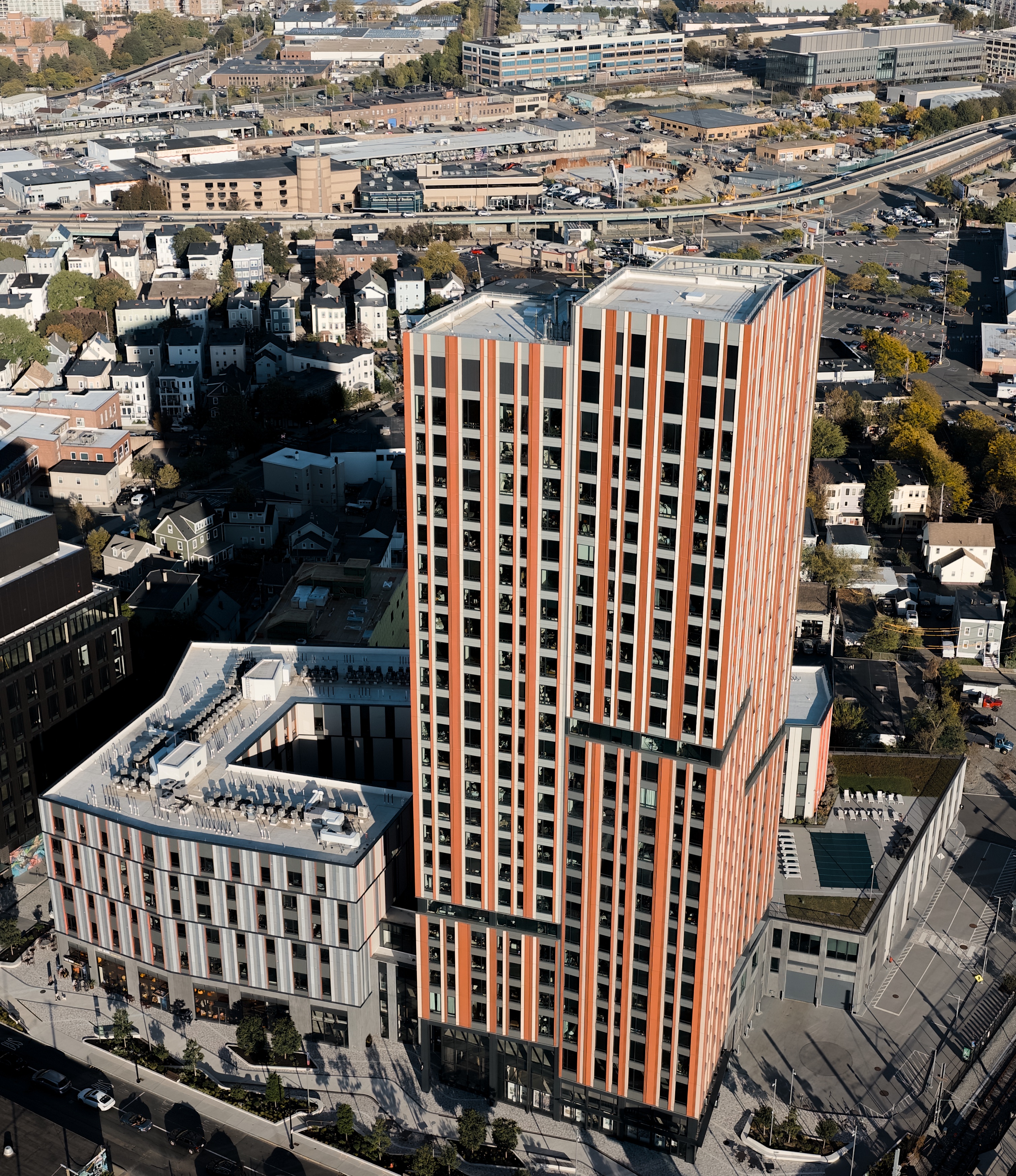 A high quality aerial image of an apartment building in outside Boston