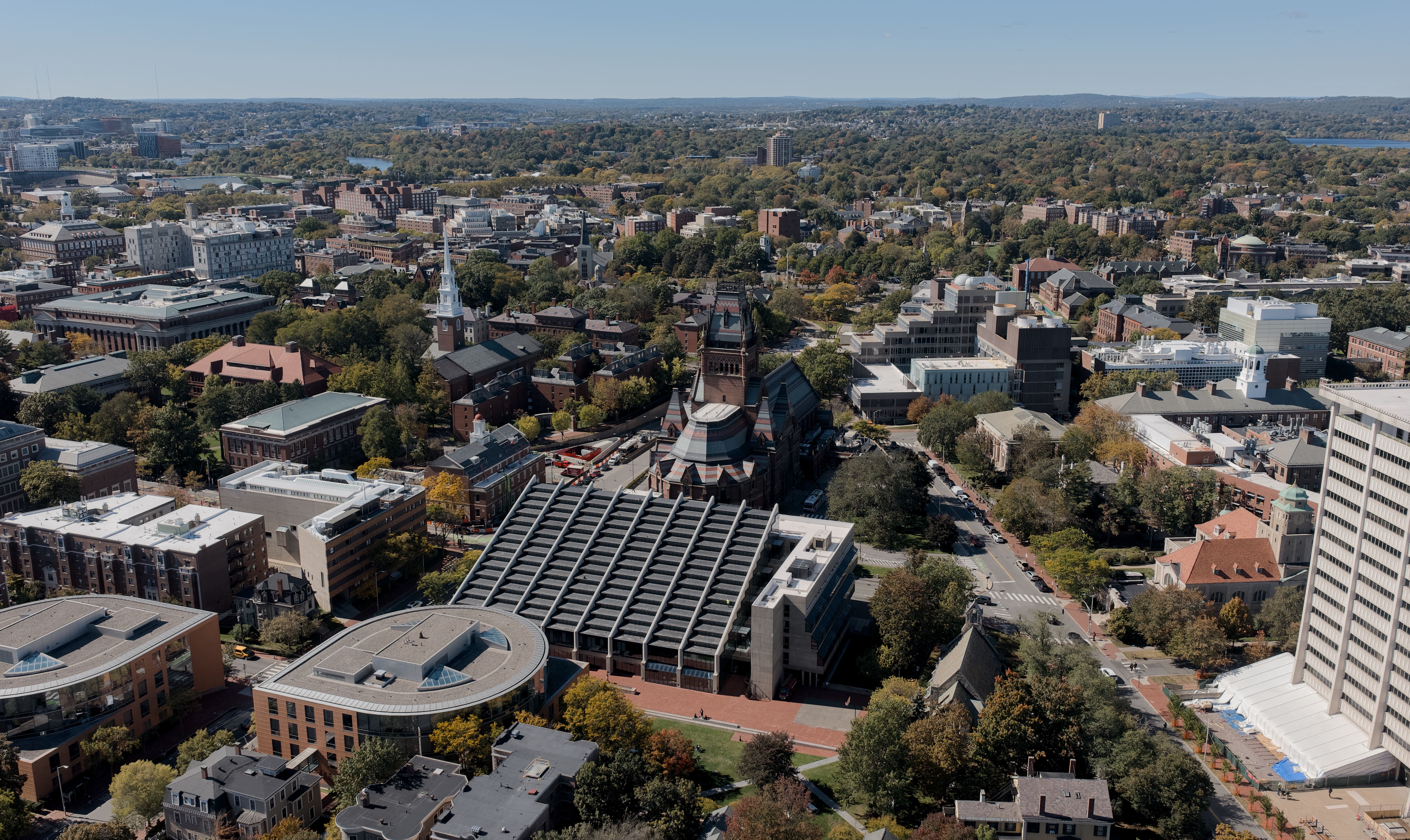 Picture of a church with trees surrounding it in Somerville, MA, captured from the sky