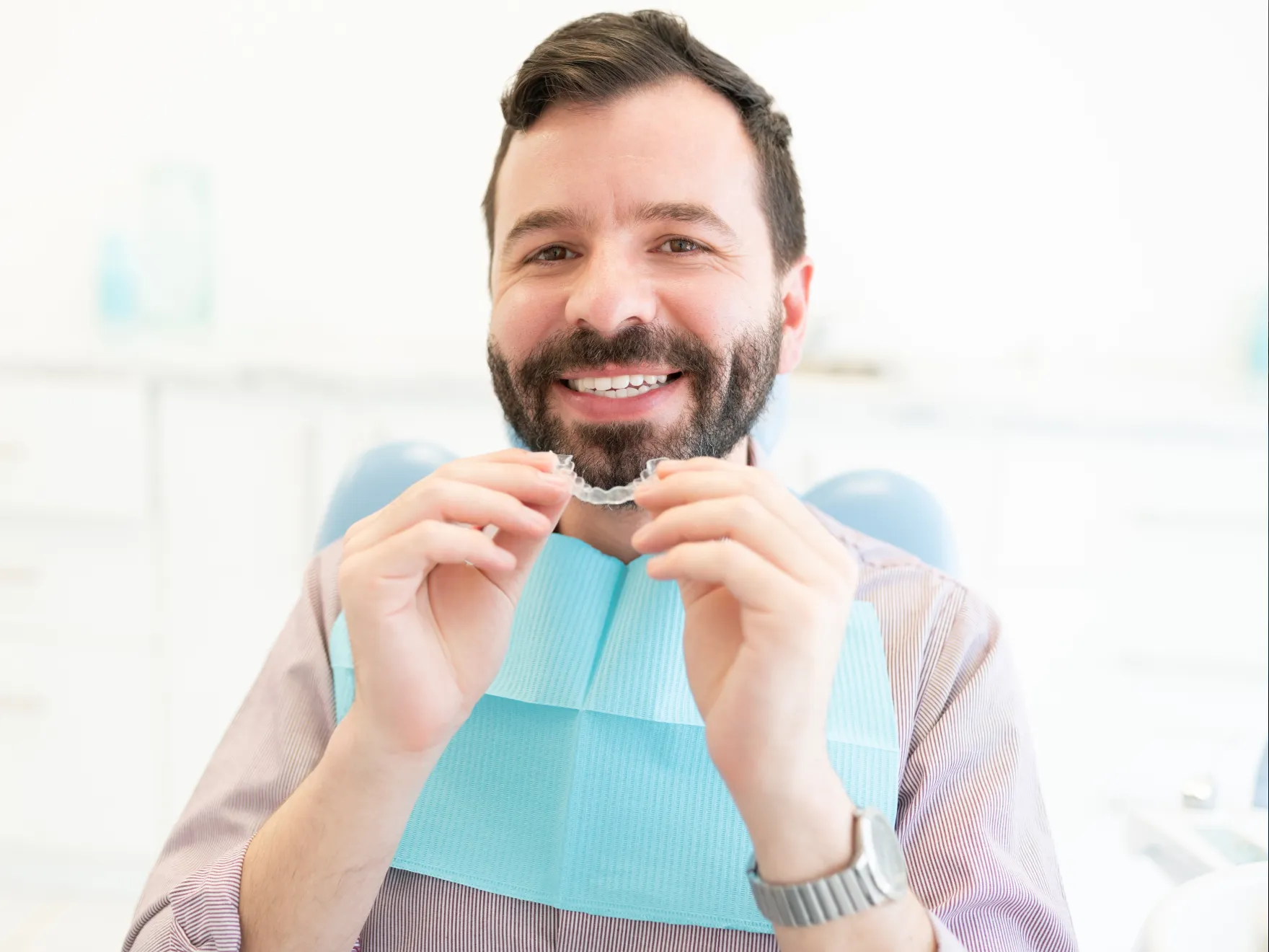 Patient with aligners smiling