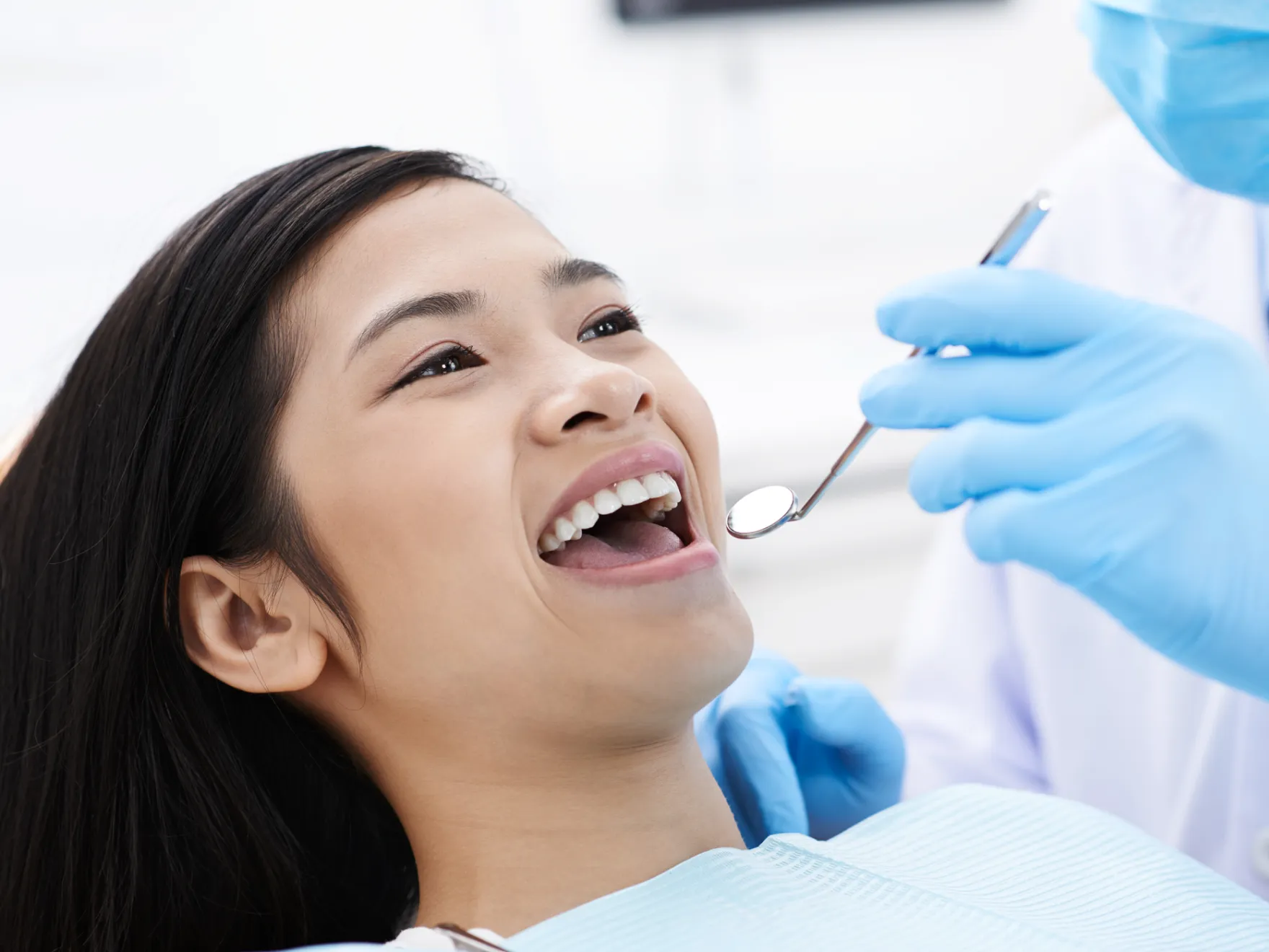 Patient smiling during dental checkup