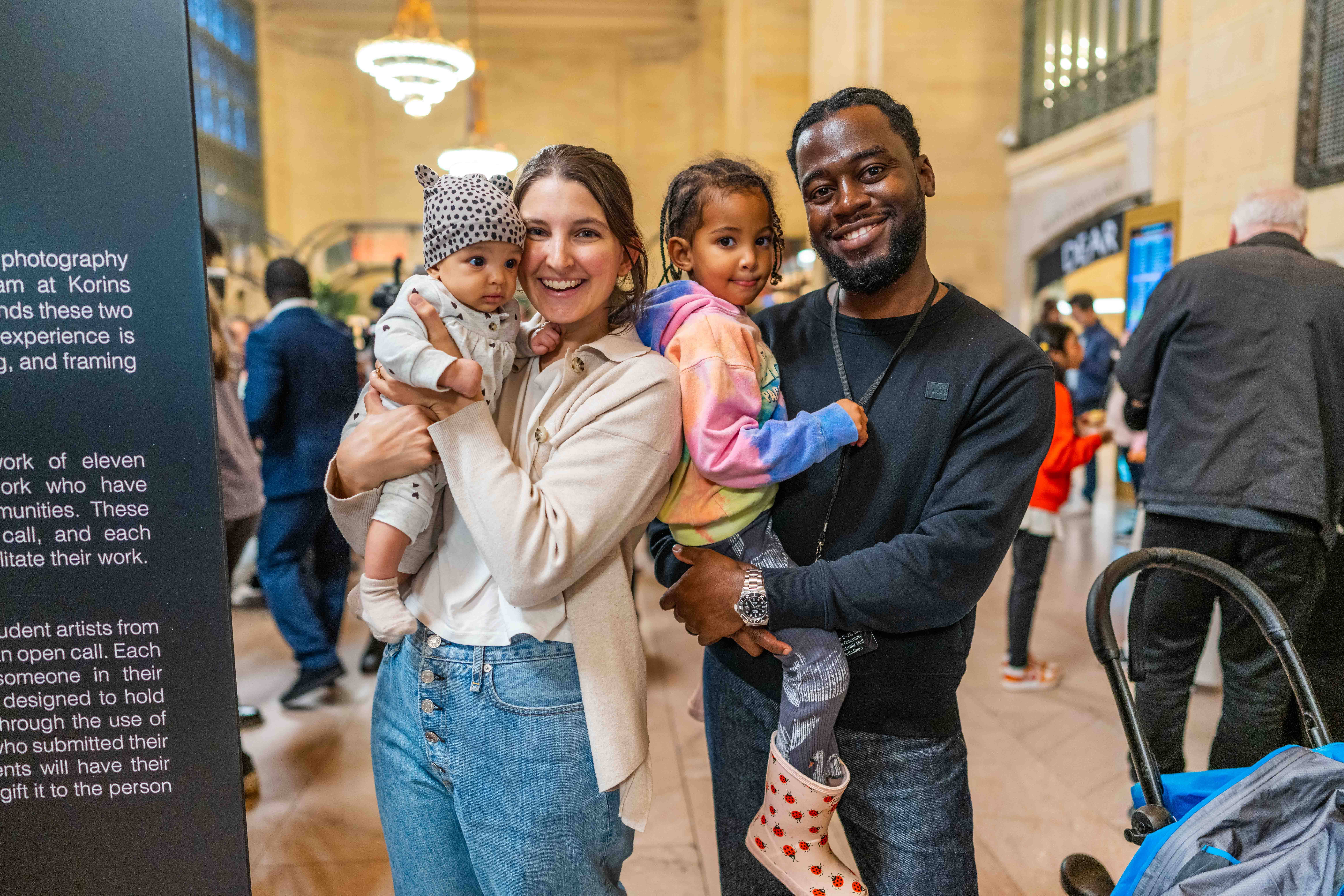 People posing at Dear New York art installation at Grand Central 