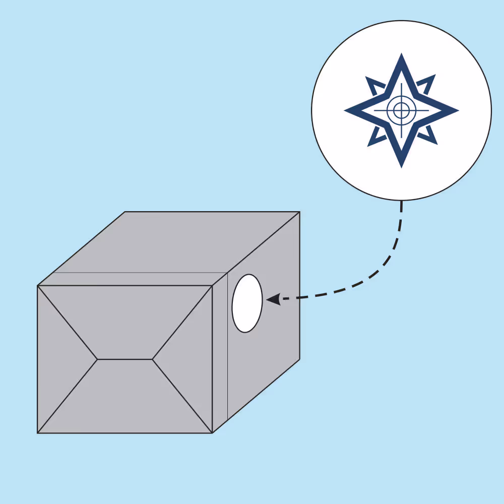 Diagram of a rectangular prism with a circular hole on one side highlighted to show a star-shaped target symbol inside.