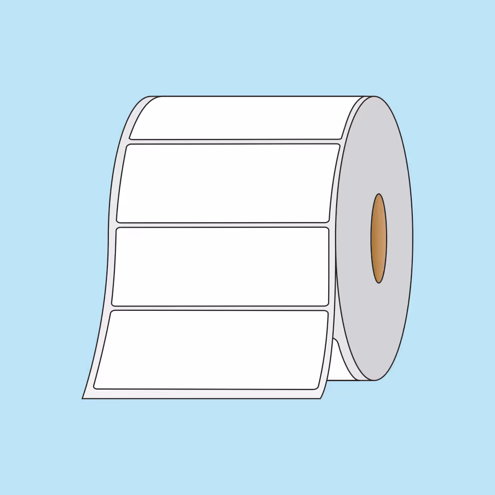 Roll of blank rectangular adhesive labels on a light blue background.